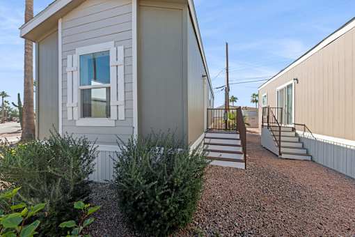 Model home exterior at Desert Valley Oasis MHC in Mesa, AZ.