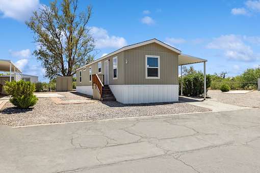 Model home exterior at Verde Plaza Manufactured Home Community in Tucson, Arizona