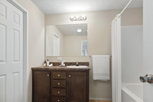 Model bathroom vanity at Candlelight Village Manufactured Home Community in Sauk, IL
