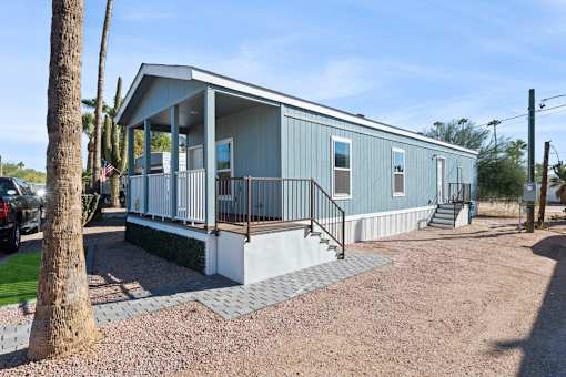 Model home exterior at Desert Valley Oasis MHC in Mesa, AZ.