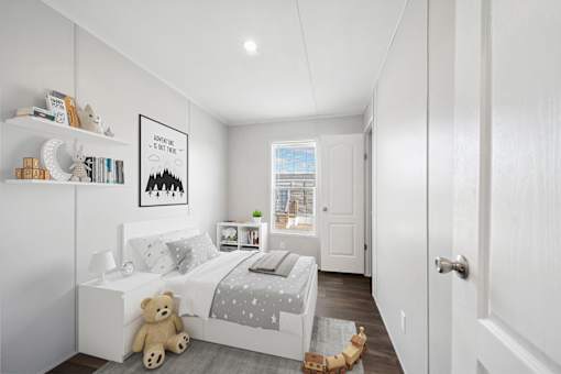 Model second bedroom at Cedar Ridge Manufactured Home Community  in Wichita, Kansas