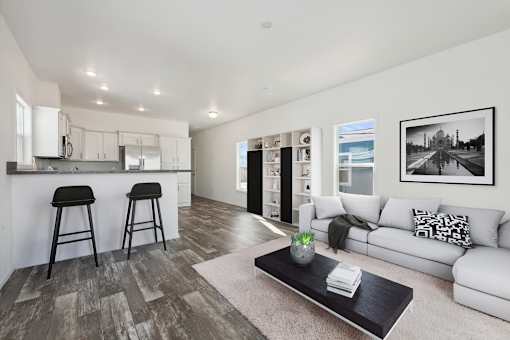Model living room and kitchen at Desert Valley Oasis MHC in Mesa, AZ.