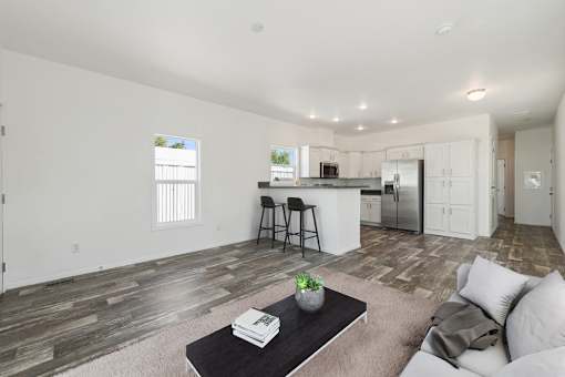 Model kitchen and living room at Desert Valley Oasis MHC in Mesa, AZ.
