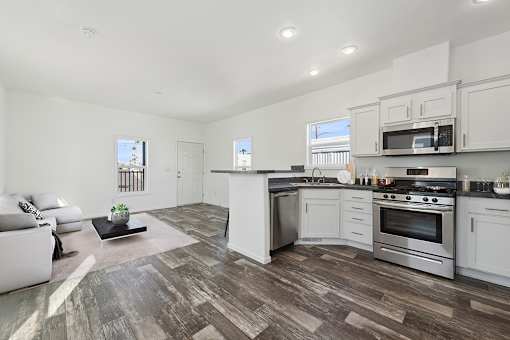 Model kitchen and dining area at Desert Valley Oasis MHC in Mesa, AZ.