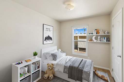 Model secondary bedroom at Verde Plaza Manufactured Home Community in Tucson, Arizona