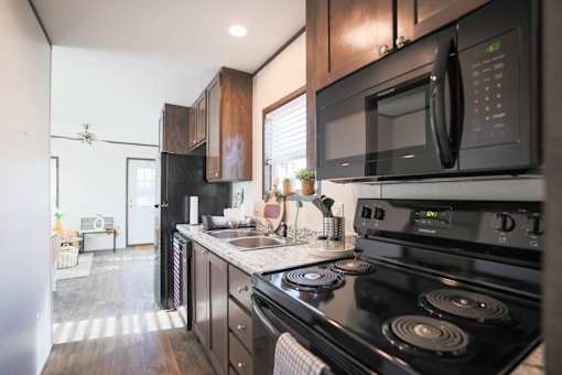 Model kitchen at Aldea Manufacture Home Community in Fort Worth, Texas