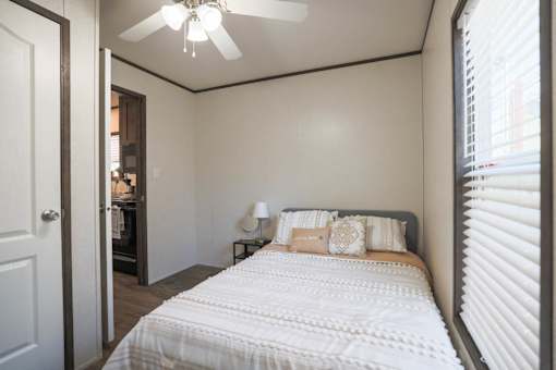 Model bedroom at Aldea Manufacture Home Community in Fort Worth, Texas