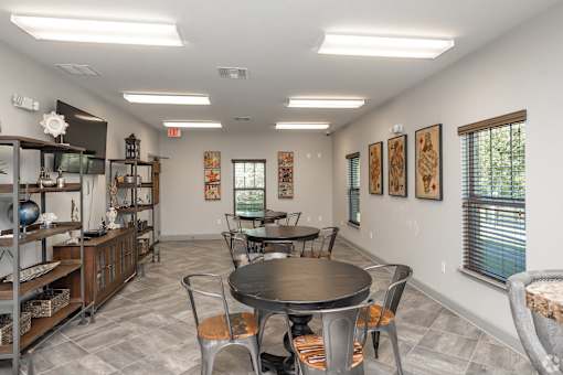 A Room With a Table and Chairs in the Center at Arbours at Pierce Creek, Alabama, 36608