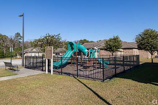 A Playground With a Green Slide at Arbours at Pierce Creek, Alabama, 36608