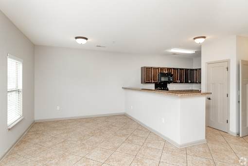 A Kitchen Area With a Countertop at Arbours at Pierce Creek, Mobile, 36608