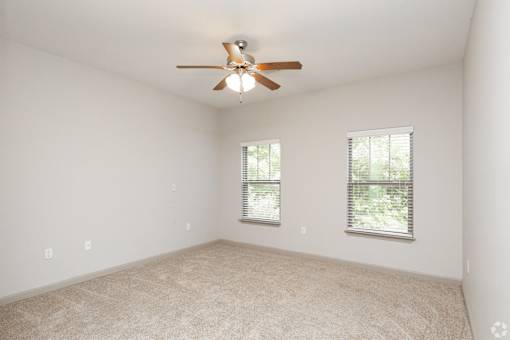 A Room With a Ceiling Fan at Arbours at Pierce Creek, Alabama