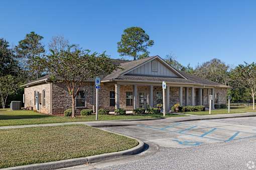 A Building With a Parking Lot at Arbours at Pierce Creek, Mobile, AL, 36608
