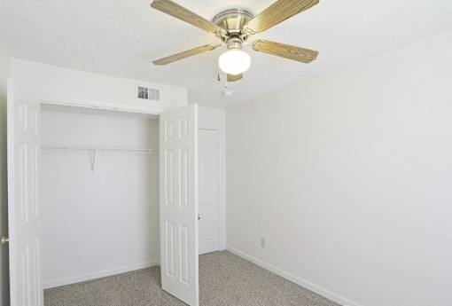 A Bedroom With Closet at Magnolia Court Apartments, Birmingham, Alabama