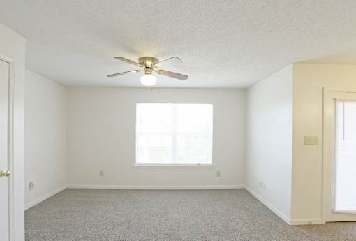 A Room With Window and Celling Fan at Magnolia Court Apartments, Birmingham, Alabama