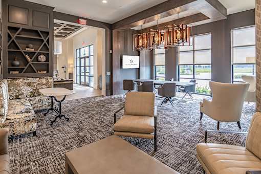 Clubhouse with large windows at Alys Crossing Apartments, Cypress