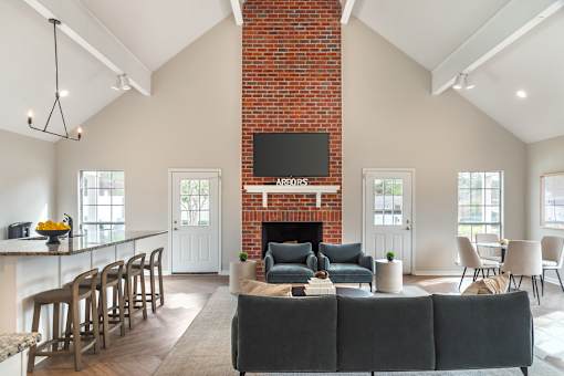 A living room with a fireplace and a couch.