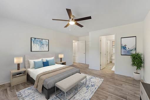 a bedroom with a large bed and a ceiling fan at Riverchase Landing, Hoover, 35244