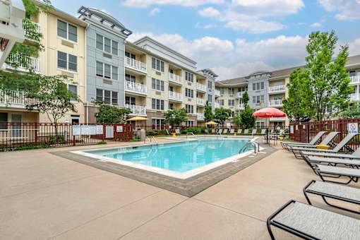 our apartments have a pool and lounge chairs in front of our building at Pier Village Apartments, Long Branch, 07740