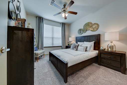 Bedroom with cozy bed at Estraya Westover Hills, San Antonio, TX