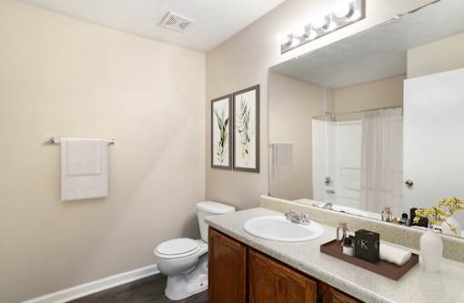Bathroom with sink at Grand at Pearl Apartments, Mississippi