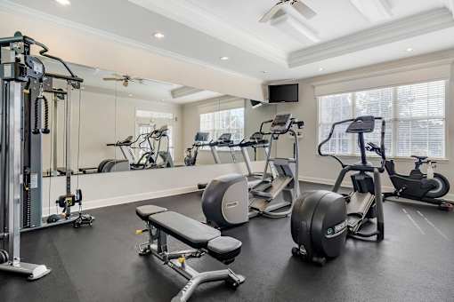 A spacious gym with a variety of exercise equipment. at Greenbrier Estates, Slidell, 70460