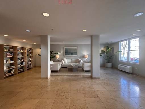 a view of the living room from the entrance to the library at Pier Village Apartments, Long Branch, New Jersey