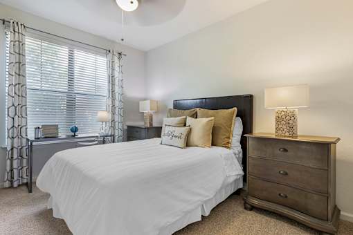 Comfortable Bedroom With Large Window at Mansfield on the Green, Milwaukie, Texas