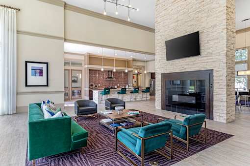 Posh Lounge Area With Fireplace In Clubhouse at Mansfield on the Green, Milwaukie, TX, Texas