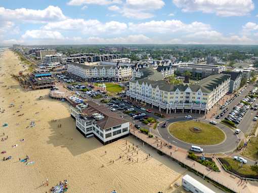 an aerial view of the beach and the city of cape cod at Pier Village Apartments, Long Branch, New Jersey