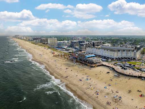 a view of the beach and the ocean from above at Pier Village Apartments, Long Branch, 07740