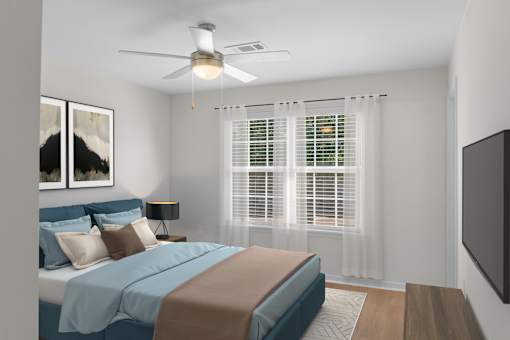 A bedroom with a bed, a ceiling fan, and a window with blinds. at Reflection Pointe, Mississippi, 39232