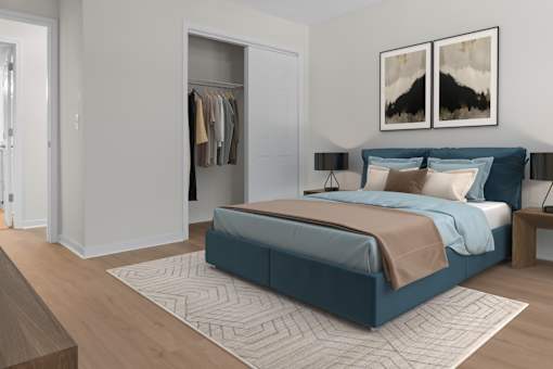 A bedroom with a large bed and a wardrobe. at Reflection Pointe, Flowood, MS, 39232