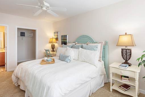 Bed and lamps at River House Apartments, Norfolk, VA