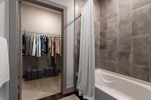 Spacious Bathrooms With Accessible Closet Comfortable Bedroom With Accessible Closet at The Cosmopolitan, Tulsa