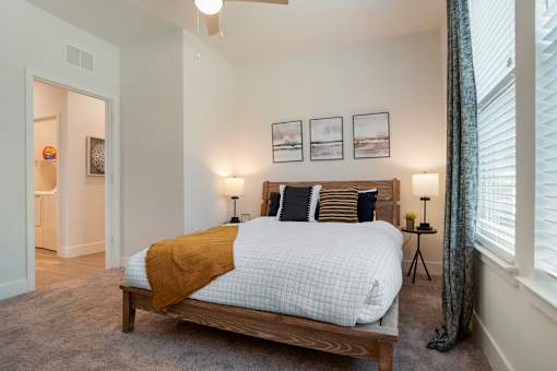 Bedroom with lamps at The Mason at Fremaux Park, Slidell, Louisiana