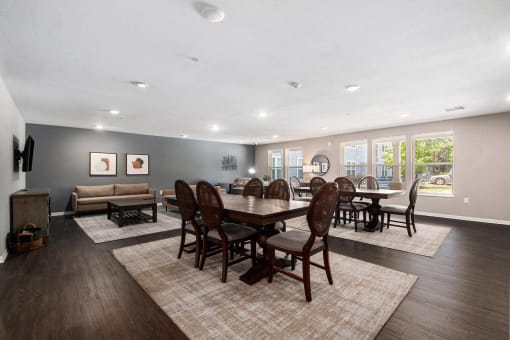 the dining room is open to the living room and kitchen