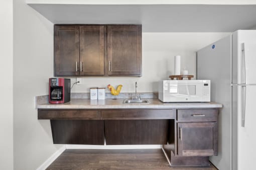 our apartments have a small kitchen with a microwave and coffee maker