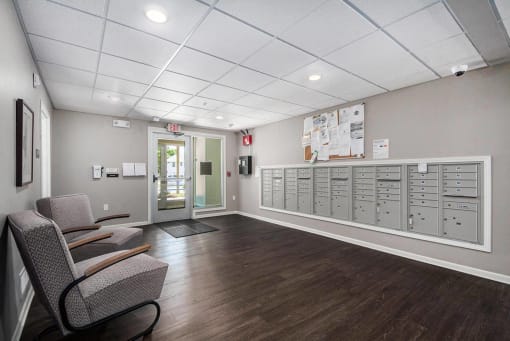 the preserve at cardinal courts spacious waiting room with chairs and lockers