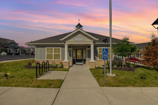 a home with a handicap sign in front of it