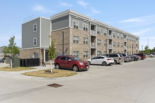 a building with a parking lot in front of it