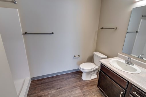 a bathroom with a toilet sink and bathtub