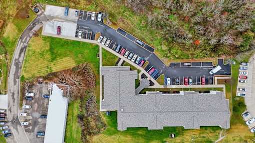 A parking lot with cars parked in it.
