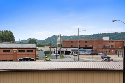 a view of the city from the roof of a building