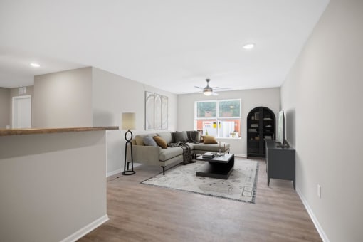 a living room with a couch and a table