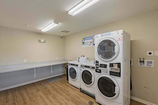 A laundry room with a washer and dryer.