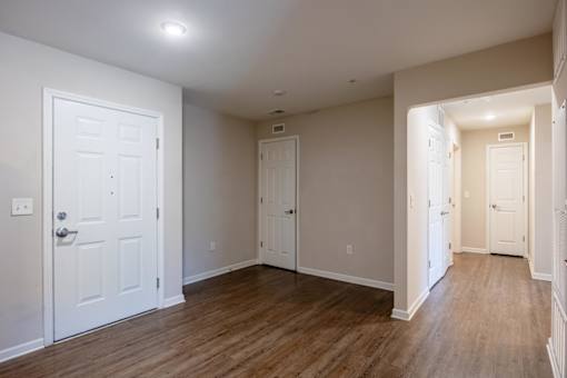 A white door is on the left side of the image.