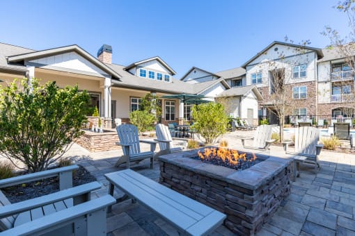 gather around the fire pit on the spacious patio