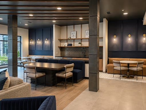 Clubroom with group workspace, café seating and kitchenette at Argento on the Broad in Arden, NC