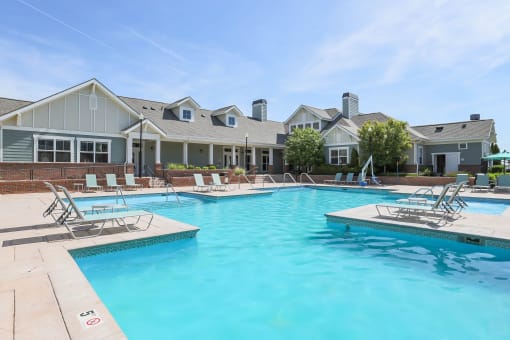 our apartments have a large swimming pool with chairs