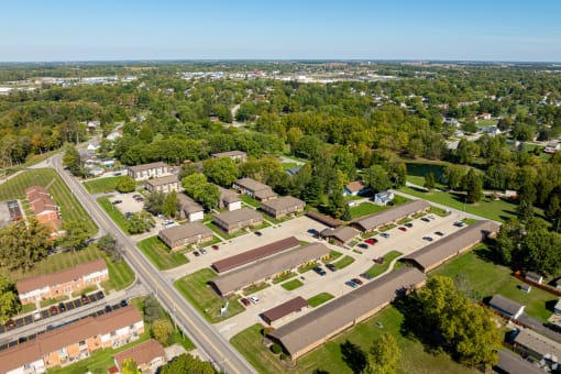 an aerial view of a neighborhood of buildings and trees
